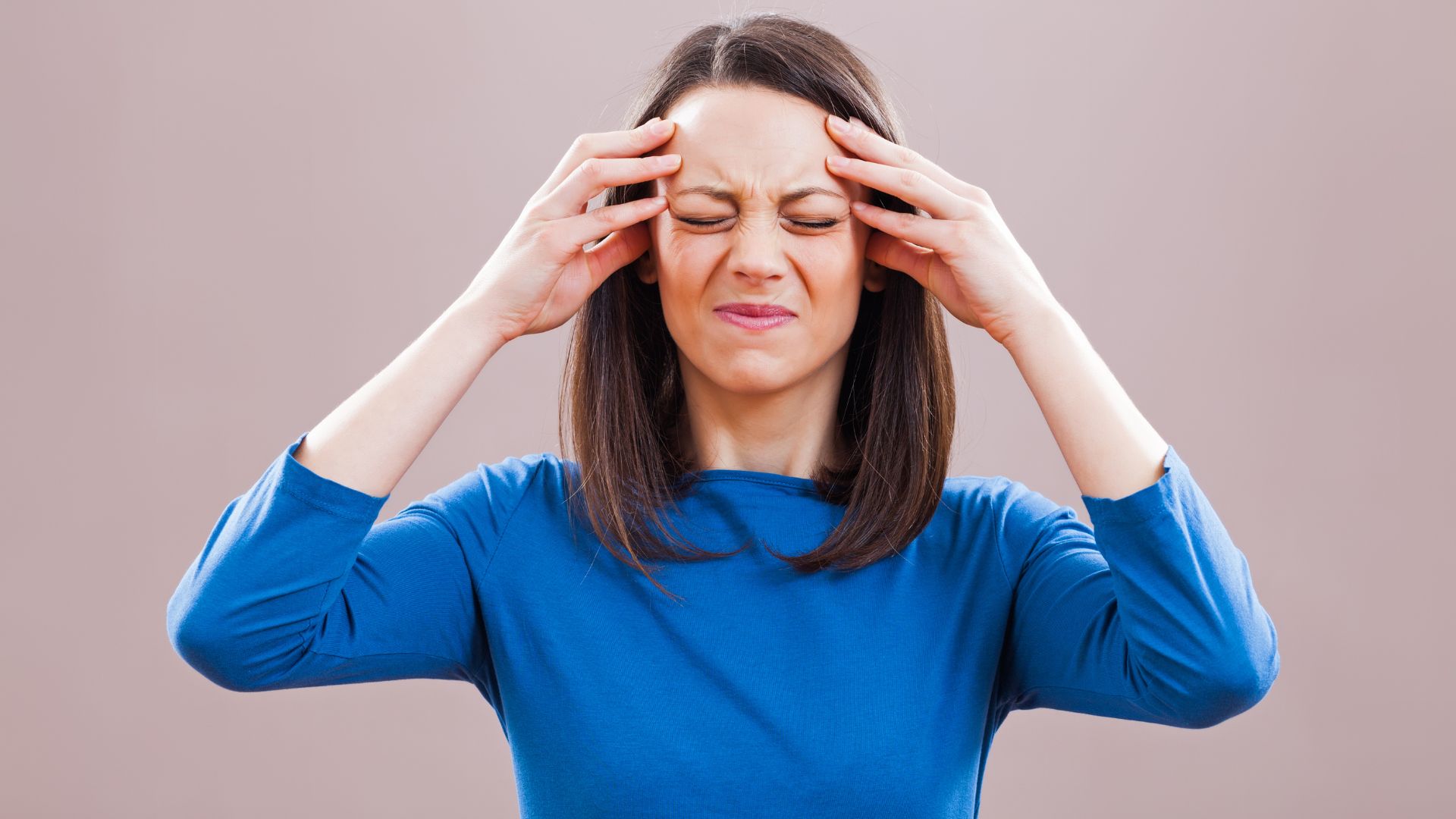 Women Suffering From Severe Headache
